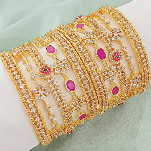 pink bangle with flower and button design